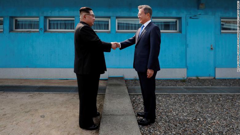 Koreas shake hands